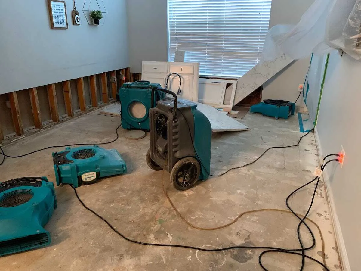 Dehumidifier in flood-cut room for Water Damage Restoration in Litchfield
